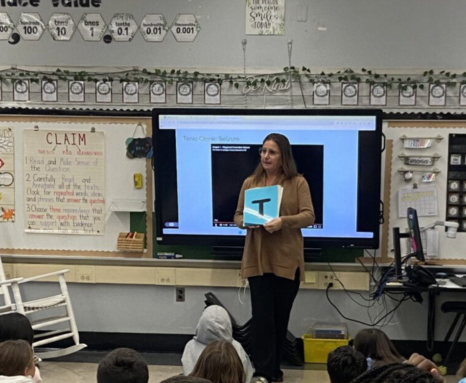 Epilepsy Services of New Jersey instructor providing seizure recognition and response training in a school classroom