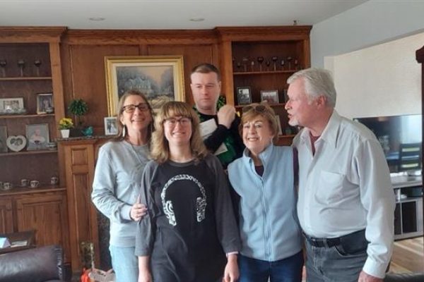 Deb Sabienza spending time with the Connolly family, highlighting trusted respite care support and long-term friendship for a family navigating autism and disabilities.