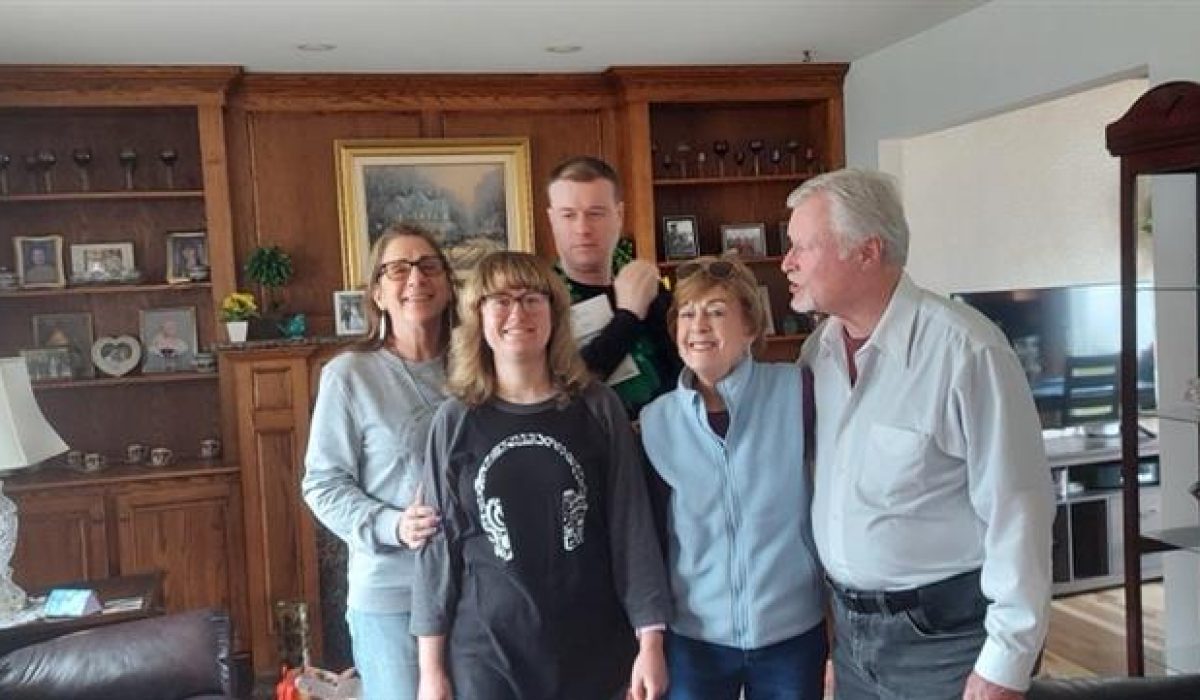 Deb Sabienza spending time with the Connolly family, highlighting trusted respite care support and long-term friendship for a family navigating autism and disabilities.