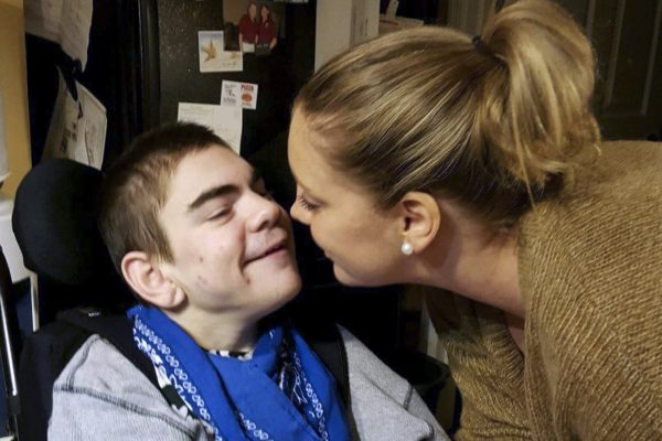 Autistic child playing with string