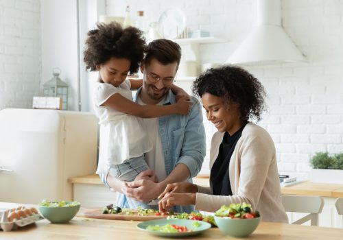 Happy,Young,Diverse,Parents,Have,Fun,Teach,Little,Biracial,Daughter